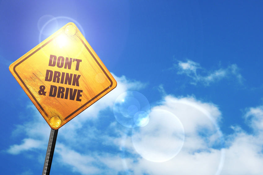 an image of a blue sky and a yellow sign with don't drink and drive written on it